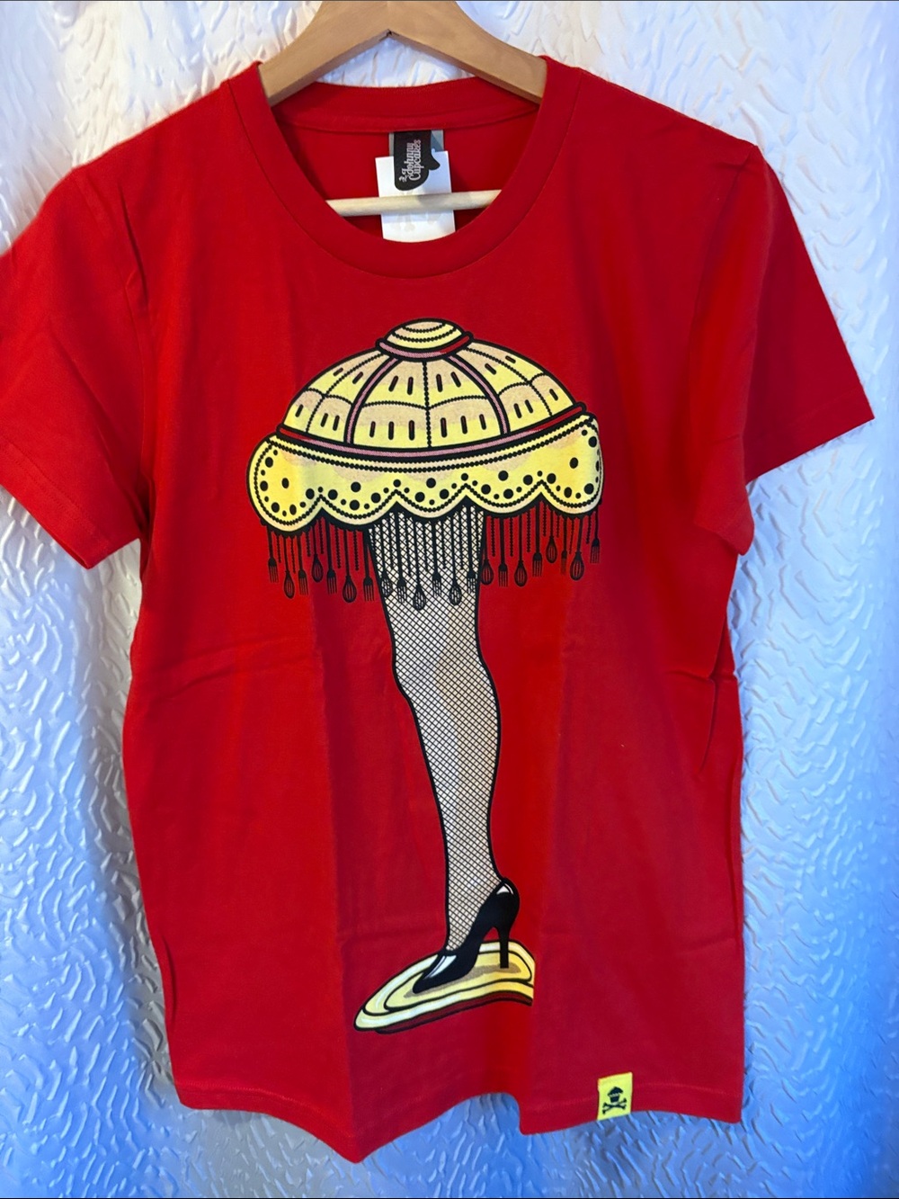 Red Graphic Tee with “Fragile” Lamp Leg Print